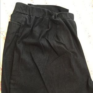 Dark dress denim slacks.